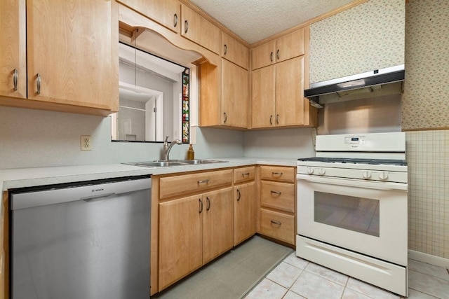 1314 Cloverleaf Dr, Austin, TX 78723 - kitchen featuring stainless steel dishwasher, white range with gas stovetop, under cabinet range hood, wallpapered walls, and light countertops