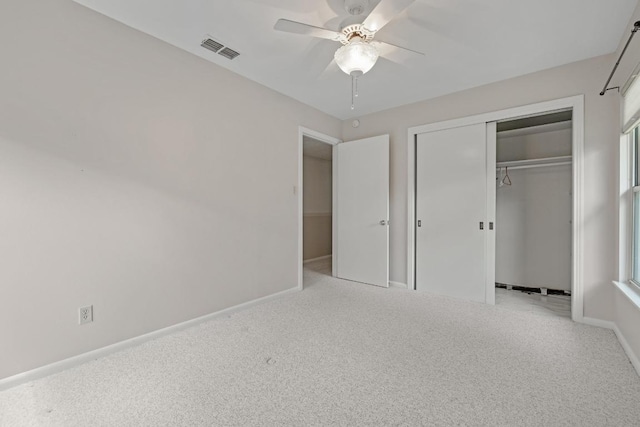 1314 Cloverleaf Dr, Austin, TX 78723 - unfurnished bedroom featuring carpet, a closet, and a ceiling fan