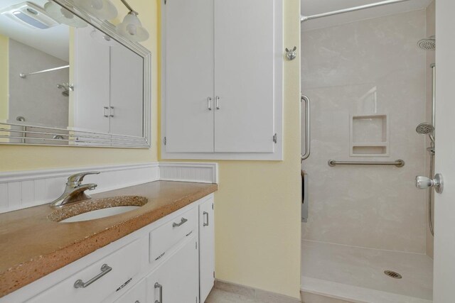 1314 Cloverleaf Dr, Austin, TX 78723 - bathroom featuring a stall shower and vanity