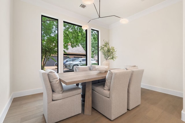 12309 Carlsbad Dr, Austin, TX 78738 - dining area featuring crown molding and wood finished floors
