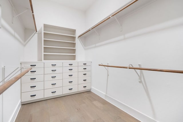 12309 Carlsbad Dr, Austin, TX 78738 - walk in closet featuring light wood-style flooring