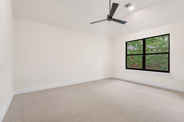 12309 Carlsbad Dr, Austin, TX 78738 - spare room with light colored carpet, a ceiling fan, and lofted ceiling