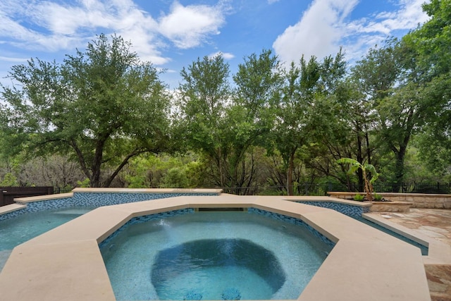 12309 Carlsbad Dr, Austin, TX 78738 - swimming pool featuring an in-ground hot tub and a patio area