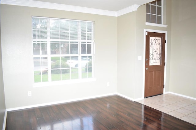 30007 Oakland Hills Dr, Georgetown, TX 78628 - entrance foyer with wood finished floors and crown molding