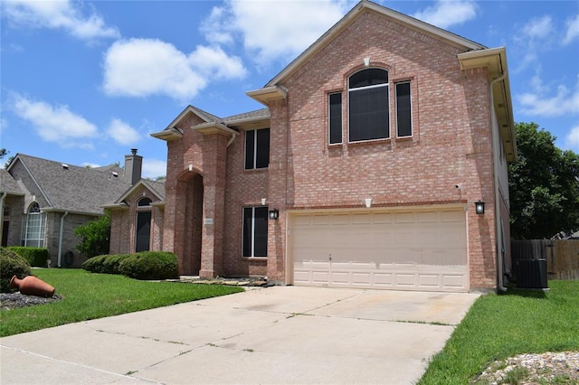 30007 Oakland Hills Dr, Georgetown, TX 78628 - traditional-style house featuring brick siding, concrete driveway, and a garage