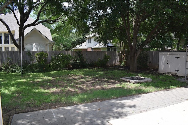 30007 Oakland Hills Dr, Georgetown, TX 78628 - view of yard with a storage shed