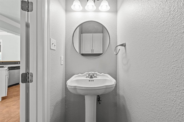 1205 Mountain View Dr, San Marcos, TX 78666 - bathroom with tile patterned flooring and a textured wall