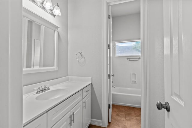 1205 Mountain View Dr, San Marcos, TX 78666 - bathroom with vanity, tile patterned floors, and bathtub / shower combination