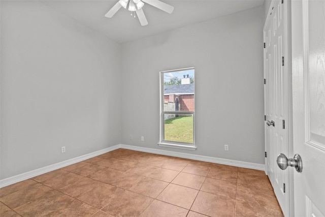 1205 Mountain View Dr, San Marcos, TX 78666 - empty room with light tile patterned floors and a ceiling fan