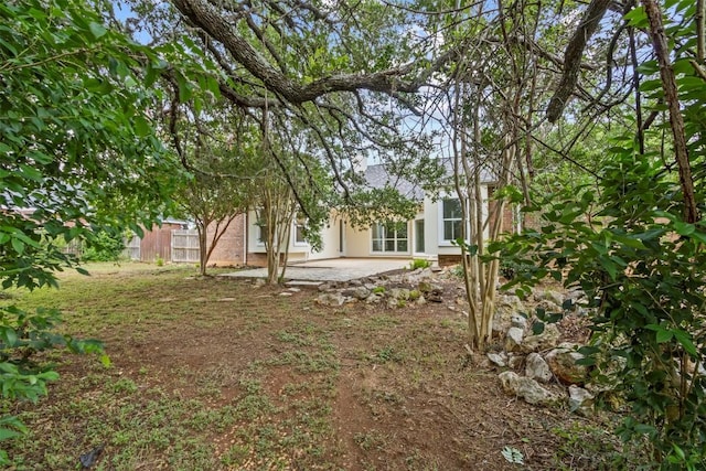 1205 Mountain View Dr, San Marcos, TX 78666 - view of yard featuring a patio
