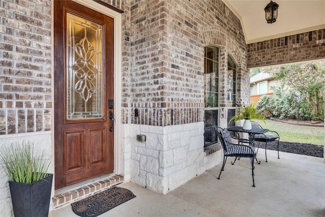 4108 Charbray Ct, Cedar Park, TX 78613 - property entrance with brick siding and a porch