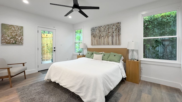 6709 Vine St, Austin, TX 78757 - bedroom featuring access to outside, wood finished floors, recessed lighting, and ceiling fan
