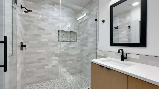 6709 Vine St, Austin, TX 78757 - bathroom featuring vanity and a stall shower