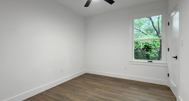 6709 Vine St, Austin, TX 78757 - unfurnished room with ceiling fan and dark wood-style floors