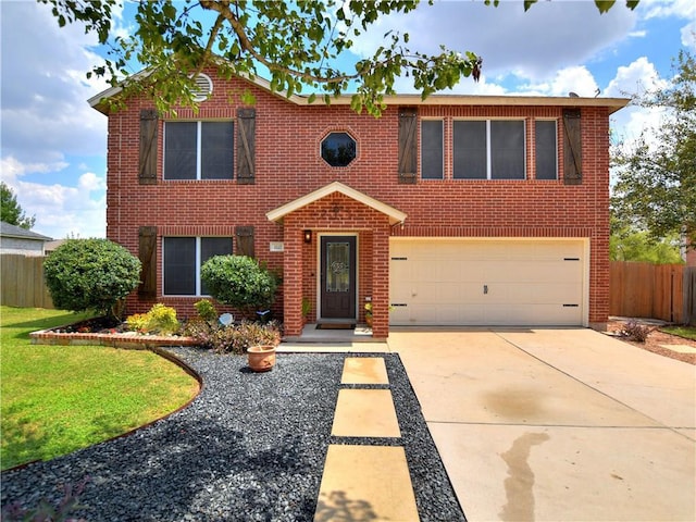 1112 Statler Bend Dr, Pflugerville, TX 78660 - traditional-style home with a garage, driveway, and brick siding
