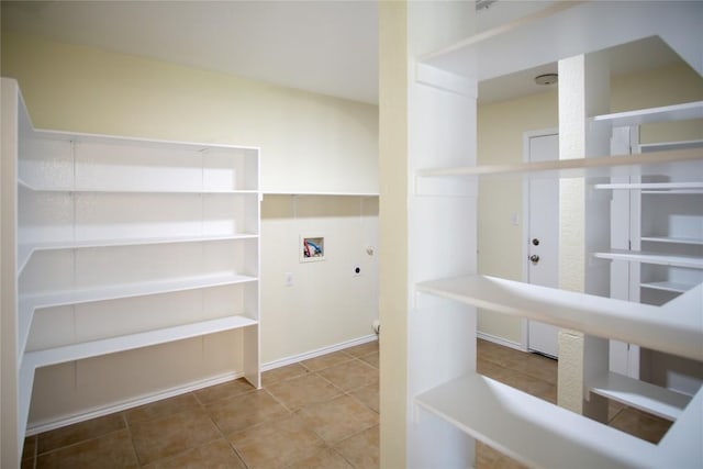 1112 Statler Bend Dr, Pflugerville, TX 78660 - washroom with washer hookup and tile patterned flooring