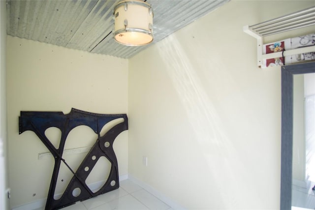 1112 Statler Bend Dr, Pflugerville, TX 78660 - tiled bedroom with baseboards