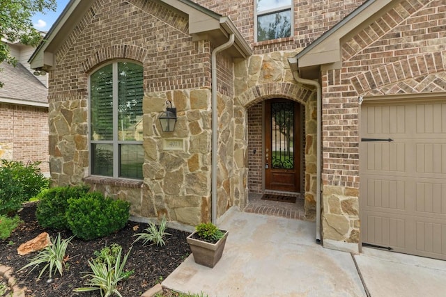 4013 Gloucester Dr, Cedar Park, TX 78613 - entrance to property with stone siding, an attached garage, and brick siding