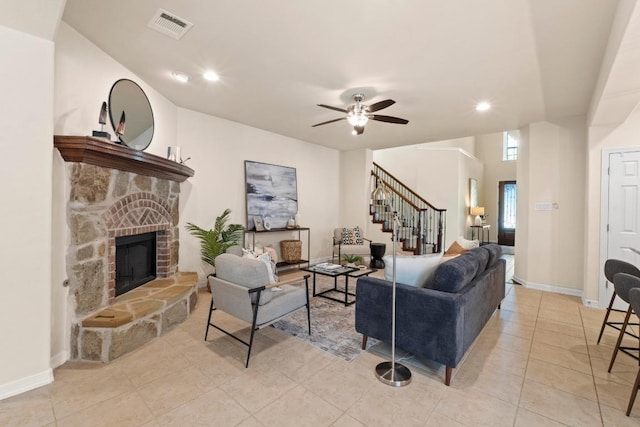 4013 Gloucester Dr, Cedar Park, TX 78613 - living area with stairs, a fireplace, a ceiling fan, recessed lighting, and light tile patterned floors