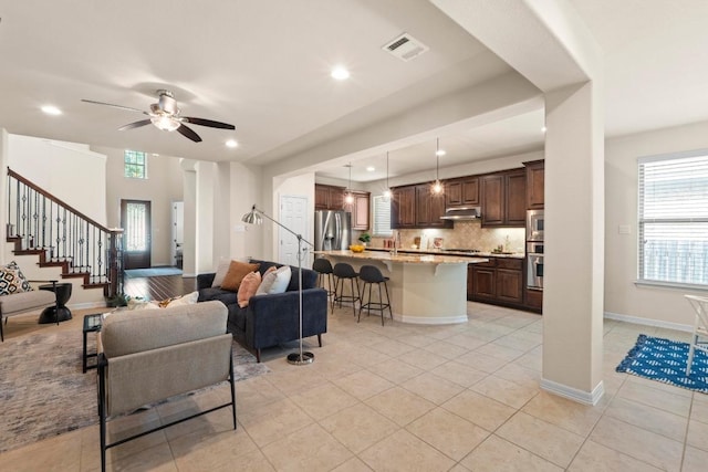 4013 Gloucester Dr, Cedar Park, TX 78613 - living area with stairs, light tile patterned floors, recessed lighting, and ceiling fan