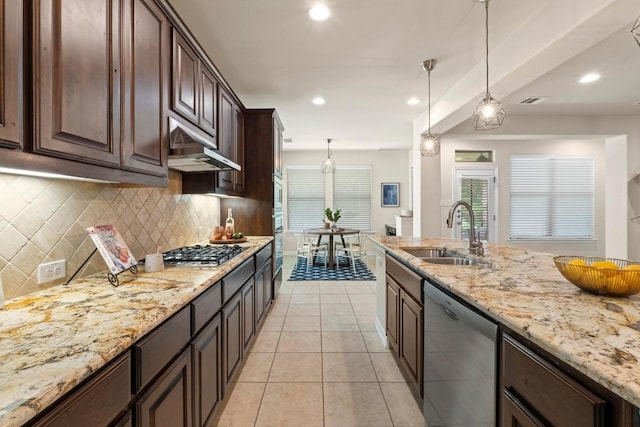 4013 Gloucester Dr, Cedar Park, TX 78613 - kitchen featuring appliances with stainless steel finishes, tasteful backsplash, light stone counters, light tile patterned floors, and recessed lighting