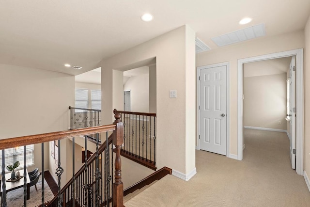 4013 Gloucester Dr, Cedar Park, TX 78613 - hall with an upstairs landing, light colored carpet, and recessed lighting