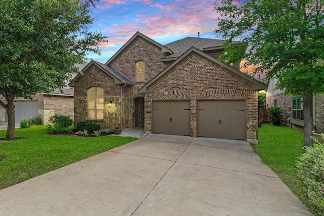 4013 Gloucester Dr, Cedar Park, TX 78613 - traditional-style home featuring a front yard, concrete driveway, a garage, brick siding, and roof with shingles