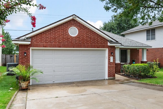 2519 Gate Ridge Dr, Austin, TX 78748 - view of front of home featuring brick siding, roof with shingles, and driveway