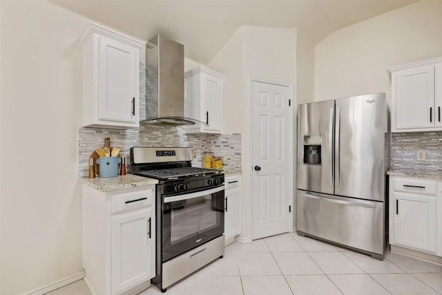 2519 Gate Ridge Dr, Austin, TX 78748 - kitchen featuring stainless steel appliances, wall chimney exhaust hood, tasteful backsplash, and white cabinets