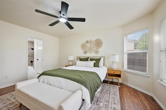 2519 Gate Ridge Dr, Austin, TX 78748 - bedroom featuring wood finished floors, a ceiling fan, and ensuite bath