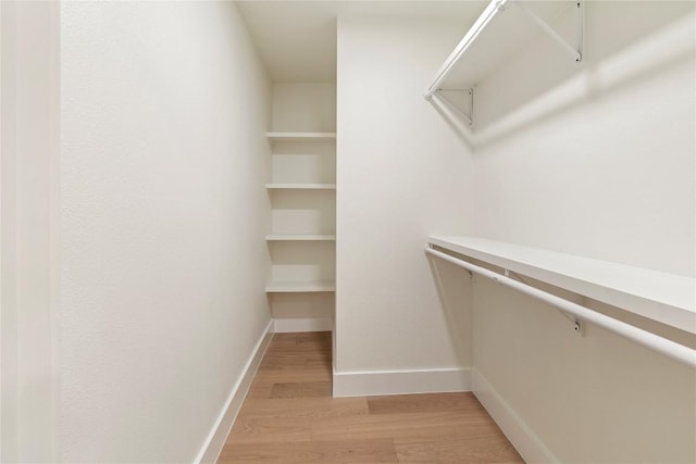 12001 Mossbrook Cv, Austin, TX 78750 - spacious closet featuring light wood-style flooring