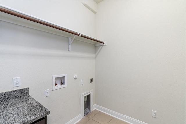 3805 Wales Ct Unit 611, Round Rock, TX 78681 - washroom with hookup for an electric dryer, hookup for a washing machine, hookup for a gas dryer, and light tile patterned floors