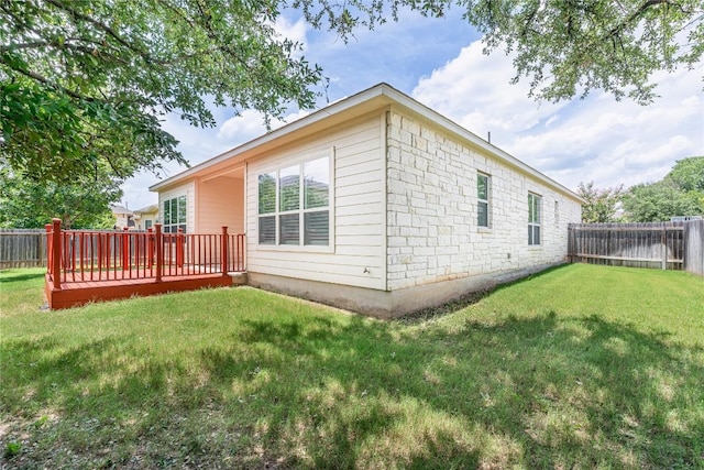 3805 Wales Ct Unit 611, Round Rock, TX 78681 - rear view of house featuring a fenced backyard and a wooden deck
