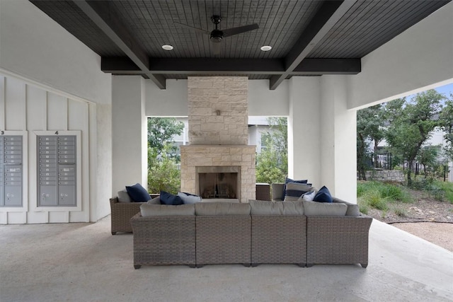 12001 Vista Parke Dr Unit 406, Austin, TX 78726 - view of patio / terrace with mail area, an outdoor living space with a fireplace, and a ceiling fan