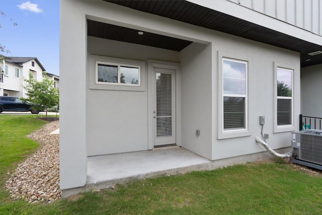 12001 Vista Parke Dr Unit 406, Austin, TX 78726 - entrance to property with stucco siding, a lawn, and a patio