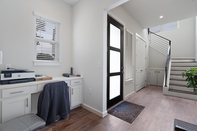 12001 Vista Parke Dr Unit 406, Austin, TX 78726 - home office featuring wood finished floors and built in desk