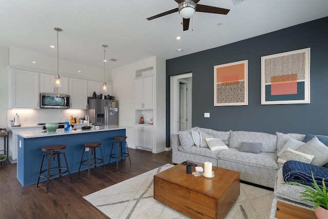 12001 Vista Parke Dr Unit 406, Austin, TX 78726 - living room featuring ceiling fan, dark wood-style floors, and recessed lighting