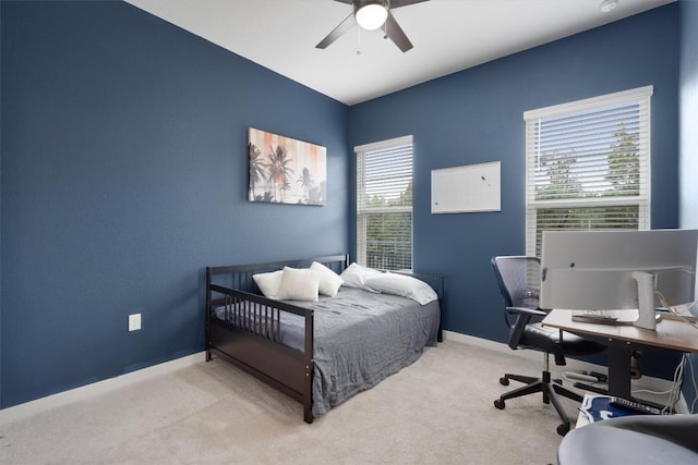 12001 Vista Parke Dr Unit 406, Austin, TX 78726 - carpeted bedroom featuring an office area and ceiling fan