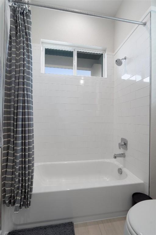 12001 Vista Parke Dr Unit 406, Austin, TX 78726 - full bath featuring shower / tub combo and tile patterned floors