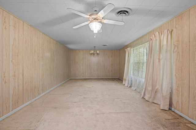 1213 Norbert St, Marlin, TX 76661 - spare room featuring wooden walls and a ceiling fan