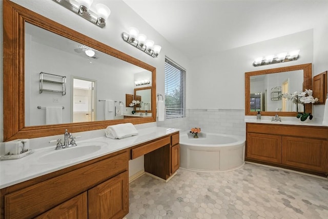 5704 Keli Ct, Austin, TX 78735 - bathroom featuring two vanities and a garden tub