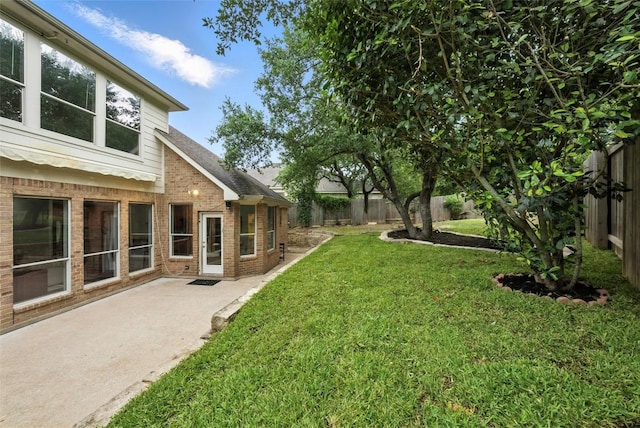 5704 Keli Ct, Austin, TX 78735 - fenced backyard featuring a patio