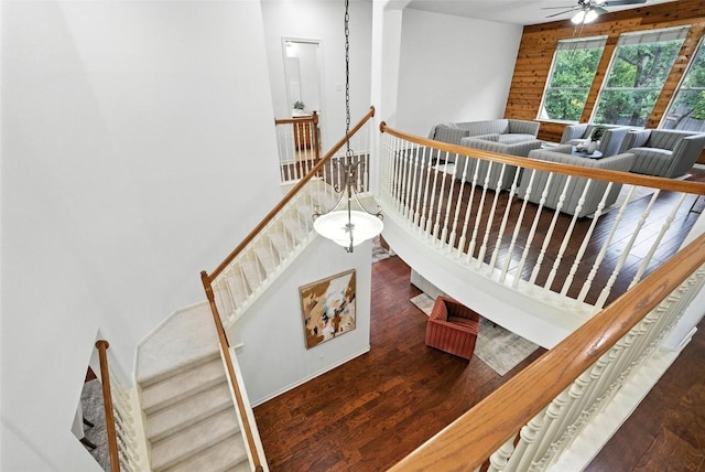 5704 Keli Ct, Austin, TX 78735 - stairway featuring wood finished floors, a ceiling fan, and a high ceiling