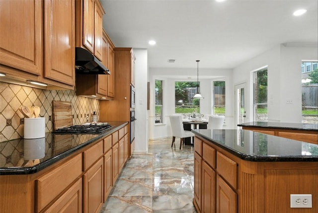 5704 Keli Ct, Austin, TX 78735 - kitchen featuring under cabinet range hood, light marble finish flooring, decorative backsplash, recessed lighting, and gas cooktop