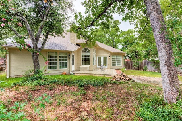 6604 Donner Cv, Austin, TX 78749 - back of house featuring french doors and a patio