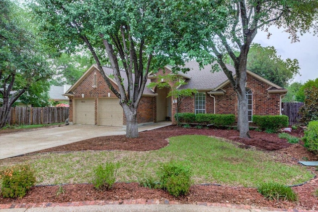 6604 Donner Cv, Austin, TX 78749 - view of front facade with brick siding, concrete driveway, and a garage
