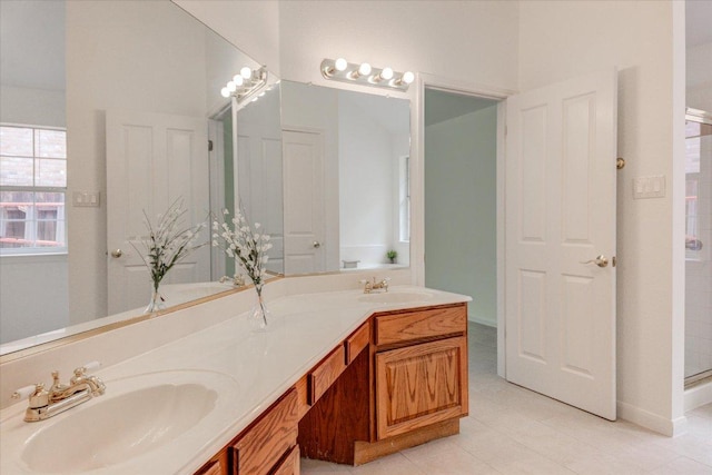 6604 Donner Cv, Austin, TX 78749 - full bath with double vanity, tile patterned flooring, and a shower