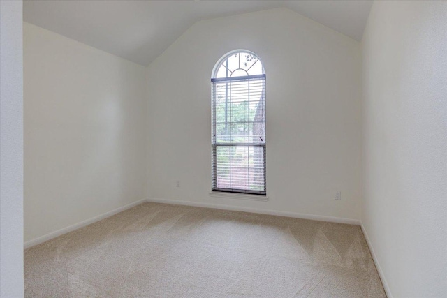 6604 Donner Cv, Austin, TX 78749 - spare room featuring light carpet and lofted ceiling