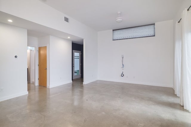5912 Toscana Ave, Austin, TX 78724 - spare room featuring concrete flooring and recessed lighting