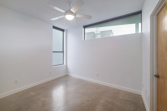 5912 Toscana Ave, Austin, TX 78724 - spare room featuring finished concrete floors and a ceiling fan